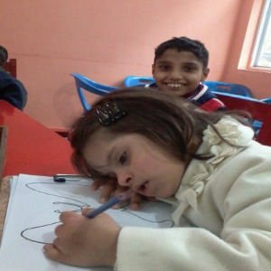 Children learning in a classroom at Chambeli Institute